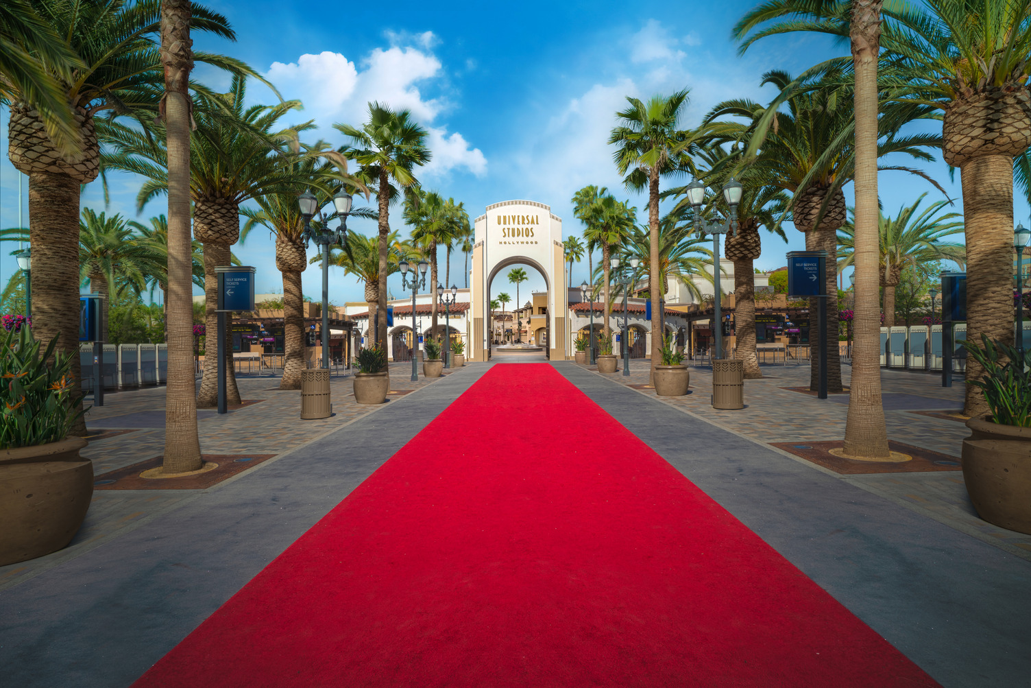 Palm-lined red carpet leading to Universal Studios Hollywood